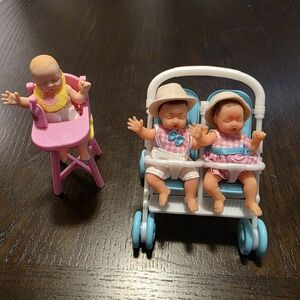 Adorable Baby Doll Trio with Stroller and High Chair